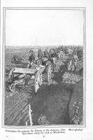 Page 41: Australians re-entering the Somme in the Autumn, 1916. Mud splashed gun teams along the road to Montauban.