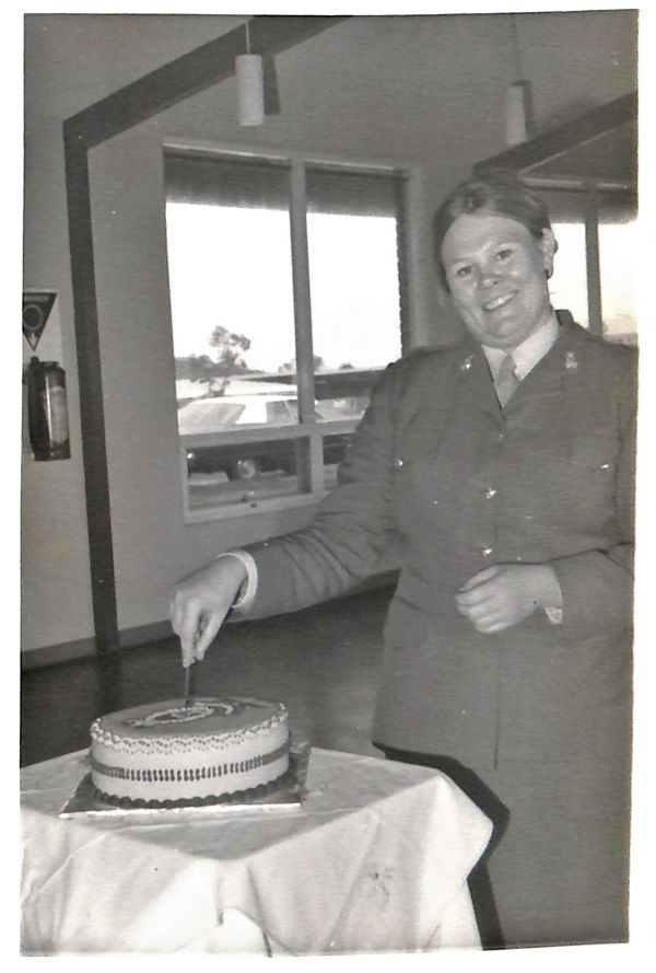 RAANC 70th Birthday Celebrations, WO2 Glenys Morgan cutting the cake