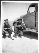 George M and Len L eating dry rations - bully beef and biscuits