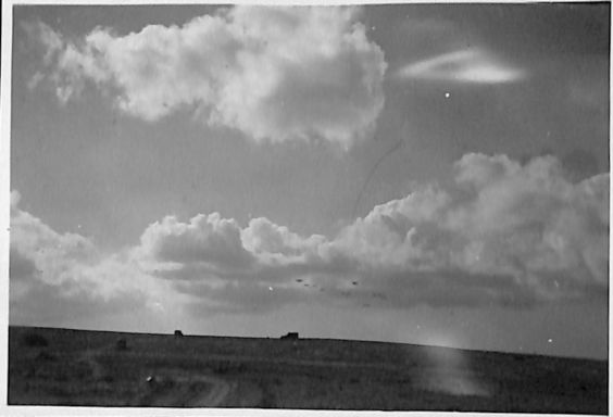 a formation of our bombers skimming along the horizon.