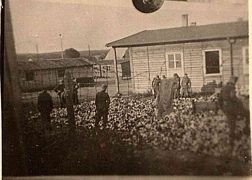 Hohenfals Stalag 383 - Jerries searching camp refuse dump Aug 1943.jpg
