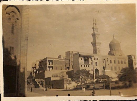 a view of a mosque in the distance in Cairo