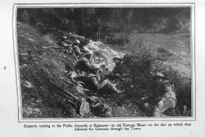 Page 63: Supports waiting in the public grounds at Bapaume -its old fortress moat-on the day on which they followed the Germans through the town.