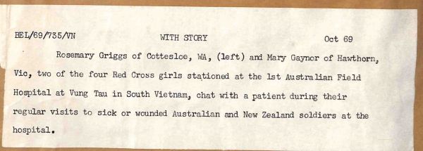 1969 Rosemary Griggs of Cottesloe, WA, (left) and Mary Gaynor of Hawthorn, Victoria, two of the four Red Cross girls stationed at the 1st Australian Field Hospital at Vung Tau in South Vietnam, chat with a patient during their regular visits to sick or wounded Australian and New Zealand soldiers at the hospital.