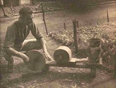 Pop Coombes coking his teaalongside my lettuce patch - Hohenfals Stalag 383 2 Jul 1944.jpg